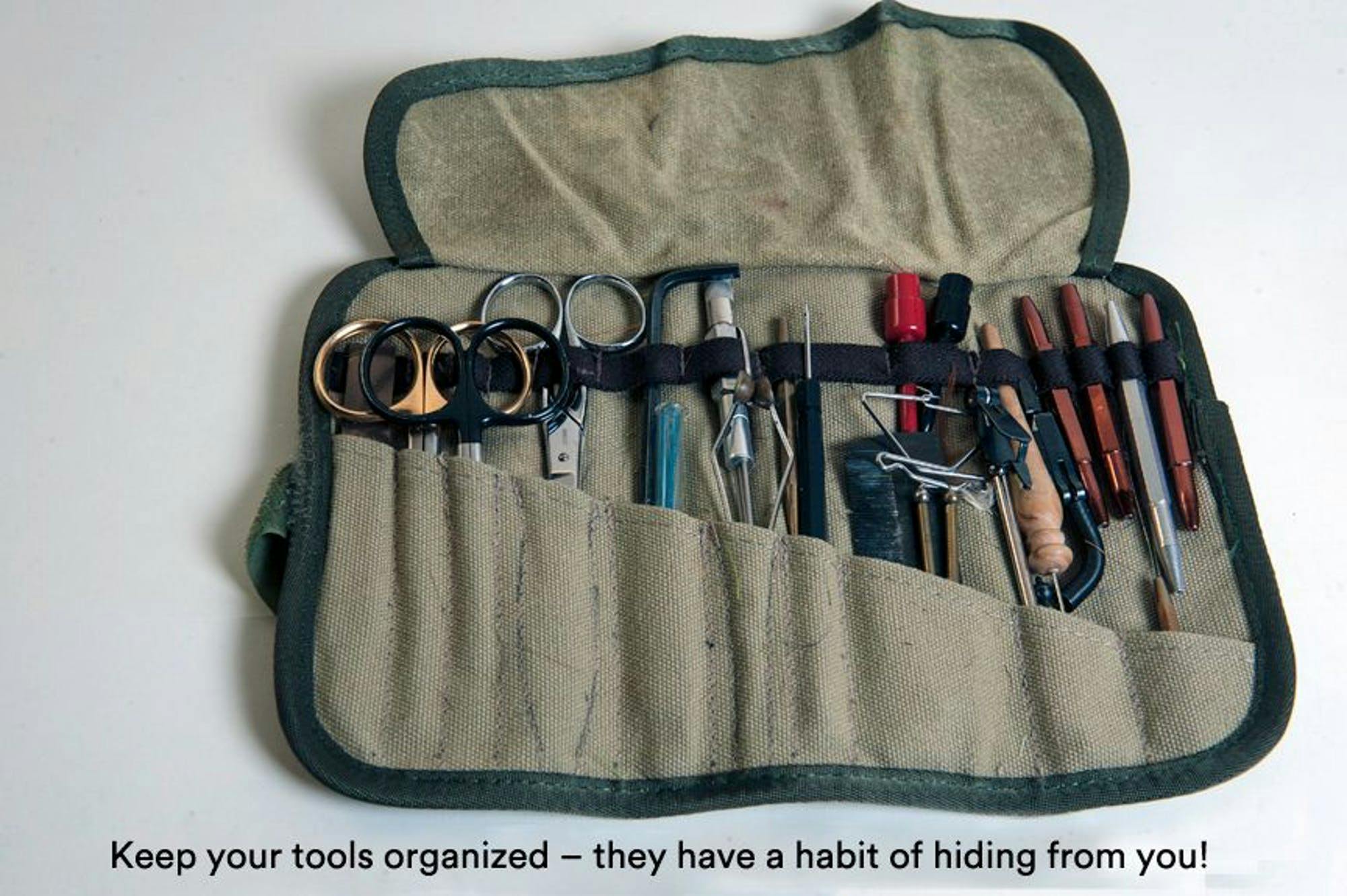 An image of a tool pouch with the text, "Keep your tools organized — they have a habit of hiding from you!"