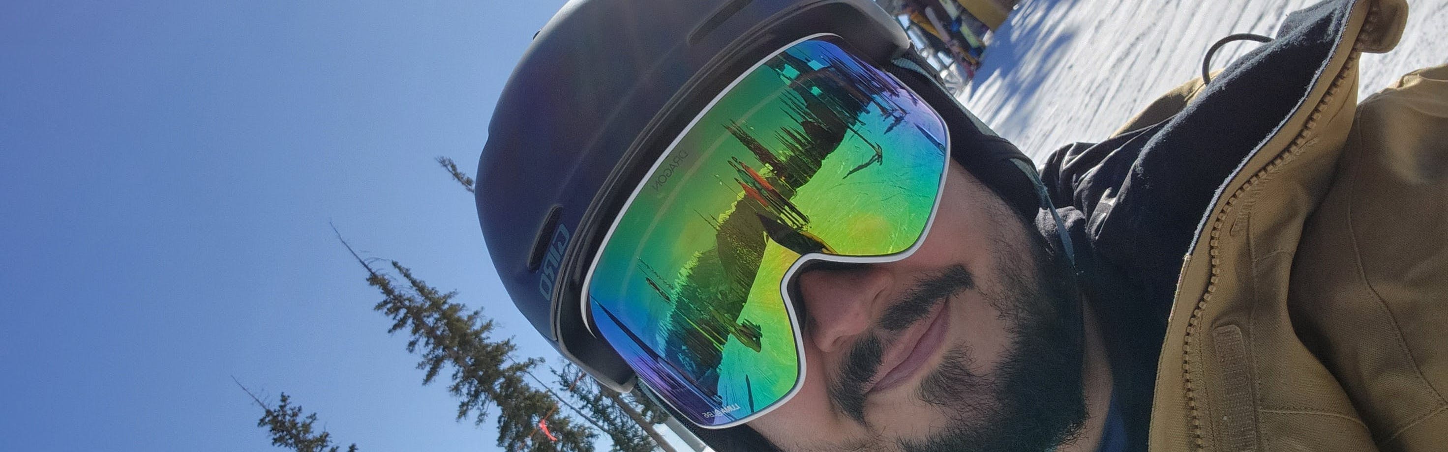 A snowboarder wearing the Giro Neo MIPS Helmet.