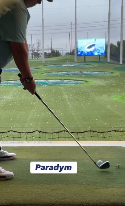 A golfer using the Callaway Paradym Iron Set. 