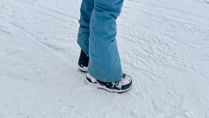 A snowboarder wearing the Ride Hera Pro Snowboard Boots · Women's · 2023. 