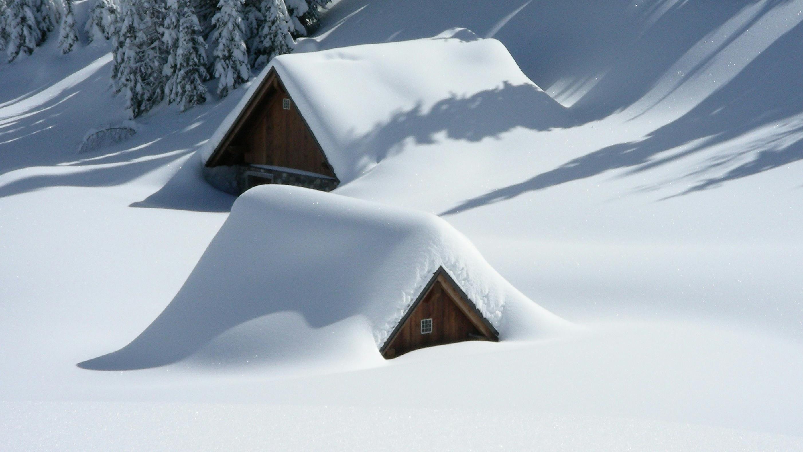 Heavy snow covering cabins