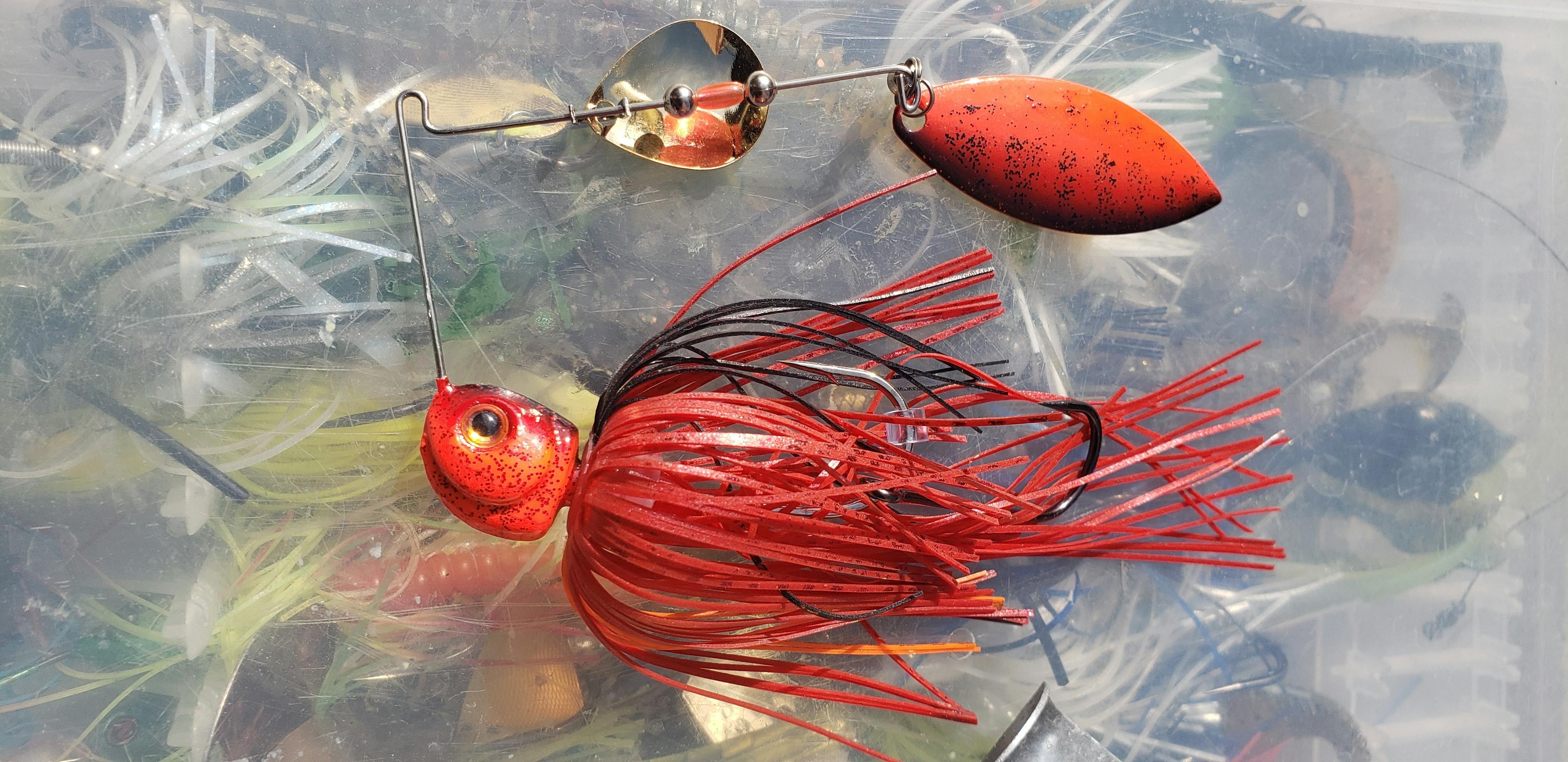 An orange-red spinnerbait from Booyah.